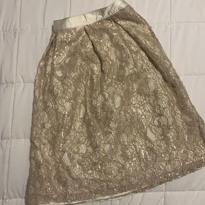 Francesca’s gold lacy skirt!